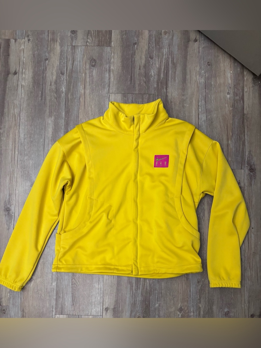 Nike women’s medium Bright Yellow Full-Zip  Jacket with Pink Logo Patch